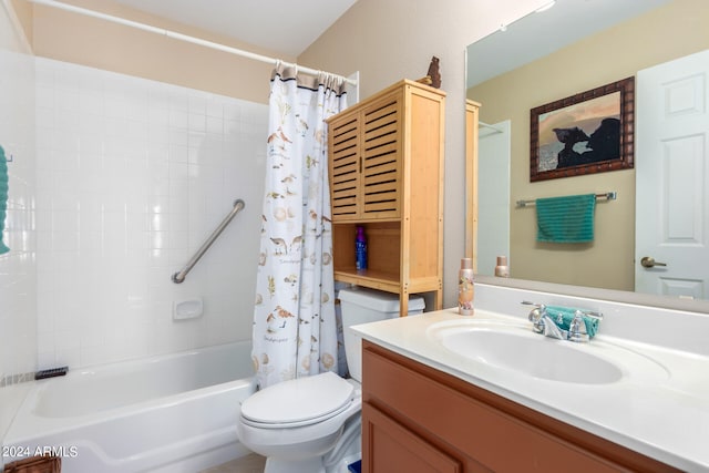 full bathroom featuring vanity, shower / tub combo, and toilet