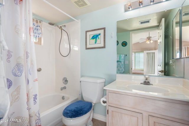 full bathroom featuring vanity, toilet, shower / bathtub combination with curtain, and ceiling fan