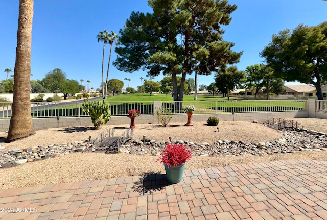 surrounding community with a patio