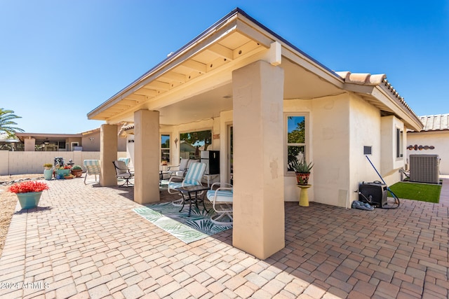 view of patio featuring cooling unit