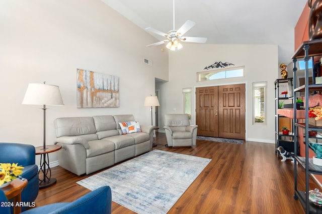 living room with ceiling fan, high vaulted ceiling, and dark hardwood / wood-style flooring