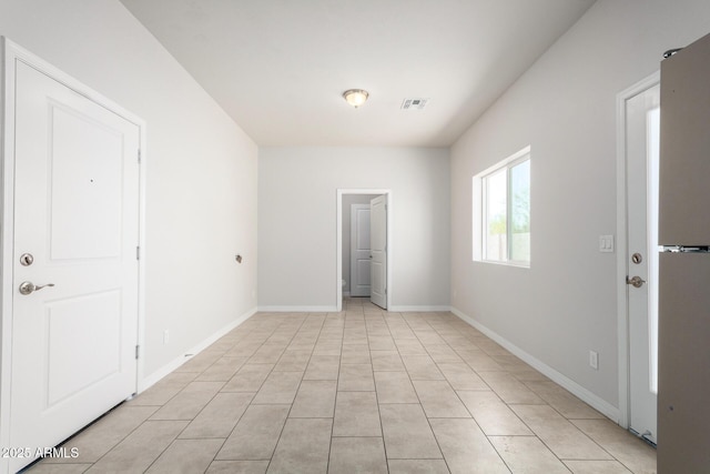 2000 N 36th St Unit 8, Phoenix, AZ 85008 - spare room featuring baseboards and light tile patterned floors