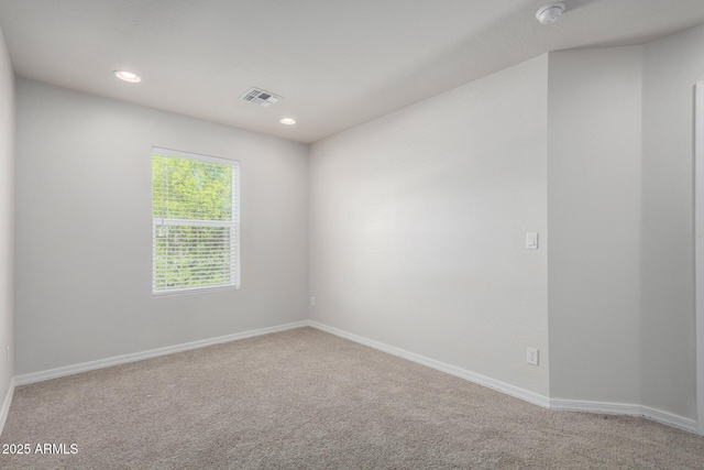 2000 N 36th St Unit 8, Phoenix, AZ 85008 - carpeted spare room with a smoke detector and recessed lighting