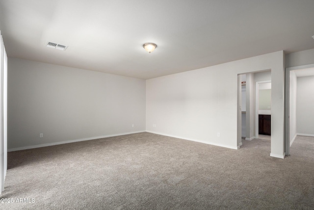 2000 N 36th St Unit 8, Phoenix, AZ 85008 - unfurnished room featuring carpet and baseboards