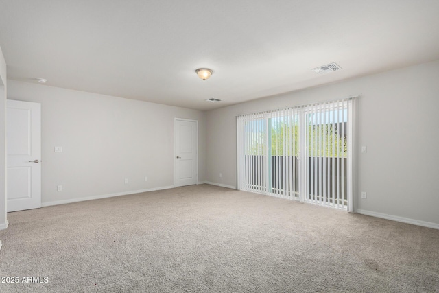 2000 N 36th St Unit 8, Phoenix, AZ 85008 - carpeted empty room with baseboards and a smoke detector