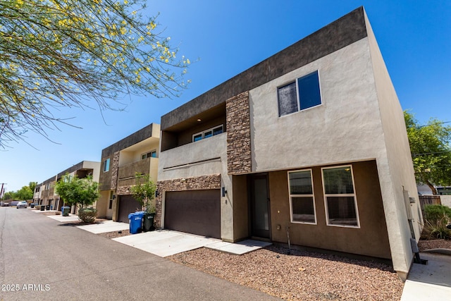 2000 N 36th St Unit 8, Phoenix, AZ 85008 - view of building exterior with an attached garage