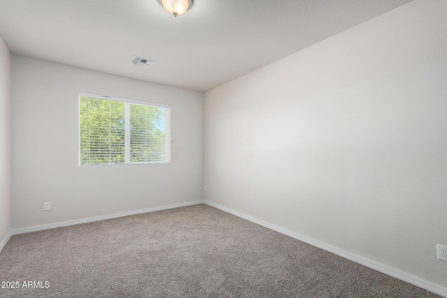 2000 N 36th St Unit 8, Phoenix, AZ 85008 - carpeted empty room featuring baseboards
