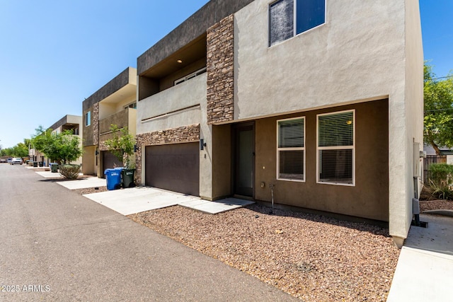 2000 N 36th St Unit 8, Phoenix, AZ 85008 - view of property featuring a garage and driveway