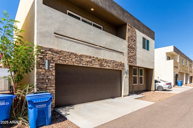 2000 N 36th St Unit 8, Phoenix, AZ 85008 - view of property featuring a garage and concrete driveway