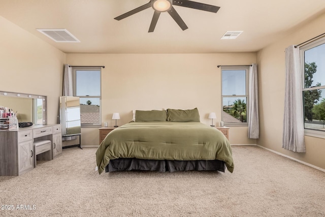 3016 W White Canyon Rd, San Tan Valley, AZ 85144 - bedroom featuring light carpet and a ceiling fan
