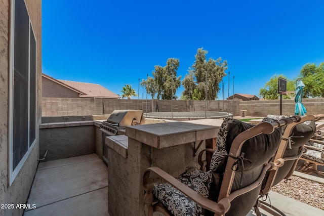 3016 W White Canyon Rd, San Tan Valley, AZ 85144 - fenced backyard with exterior kitchen