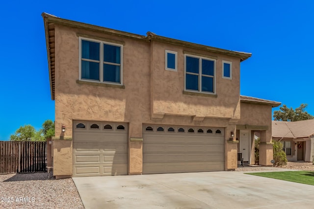 3016 W White Canyon Rd, San Tan Valley, AZ 85144 - view of front of house featuring a garage, driveway, and stucco siding