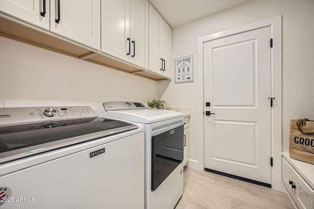 10023 E Sunnyslope Ln, Scottsdale, AZ 85258 - laundry area with independent washer and dryer and cabinet space