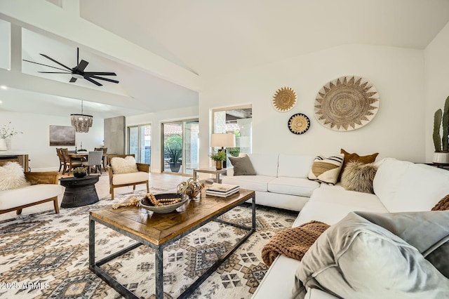 10023 E Sunnyslope Ln, Scottsdale, AZ 85258 - living area featuring a ceiling fan, a chandelier, baseboards, and high vaulted ceiling
