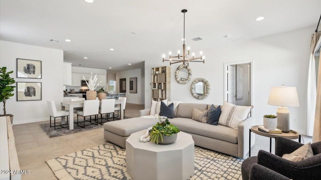 living room featuring a chandelier, visible vents, recessed lighting, and light tile patterned floors