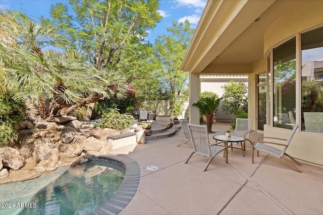 view of patio / terrace with fence