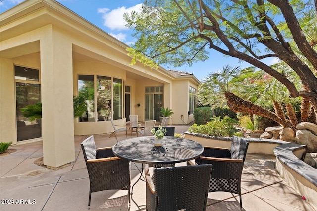 view of patio featuring outdoor dining space