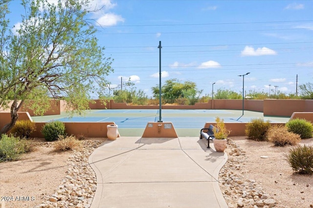 view of sport court featuring community basketball court and fence