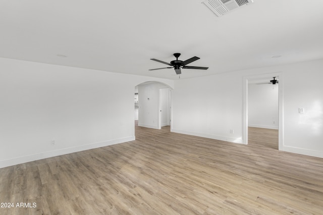 unfurnished room with ceiling fan and light hardwood / wood-style floors