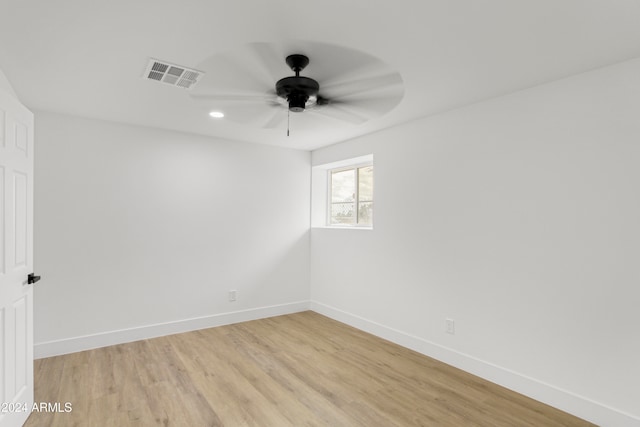 unfurnished room with ceiling fan and light hardwood / wood-style floors