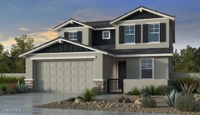 craftsman-style home featuring stone siding, board and batten siding, and concrete driveway