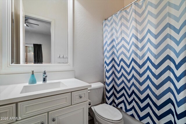 6535 W Gold Mountain Pass, Phoenix, AZ 85083 - full bathroom with vanity, a shower with shower curtain, and toilet