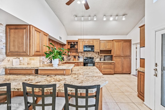 7949 W Pershing Ave, Peoria, AZ 85381 - kitchen featuring black appliances, vaulted ceiling, a peninsula, backsplash, and ceiling fan