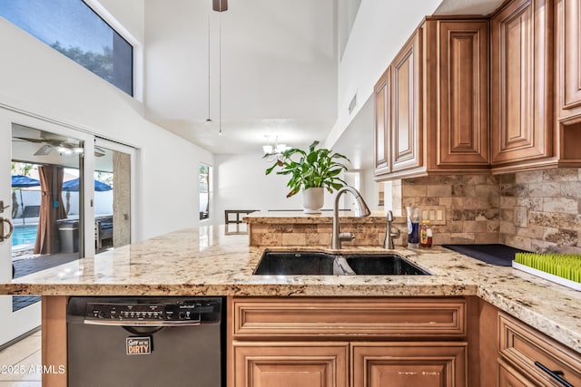 7949 W Pershing Ave, Peoria, AZ 85381 - kitchen with dishwasher, a sink, ceiling fan, plenty of natural light, and a towering ceiling