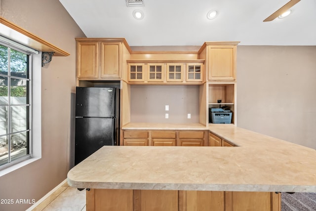 7949 W Pershing Ave, Peoria, AZ 85381 - kitchen featuring freestanding refrigerator, light brown cabinetry, glass insert cabinets, light countertops, and recessed lighting