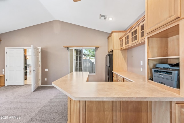 7949 W Pershing Ave, Peoria, AZ 85381 - kitchen with freestanding refrigerator, lofted ceiling, light countertops, glass insert cabinets, and a peninsula