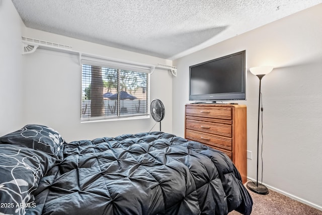 7949 W Pershing Ave, Peoria, AZ 85381 - carpeted bedroom featuring a textured ceiling and baseboards