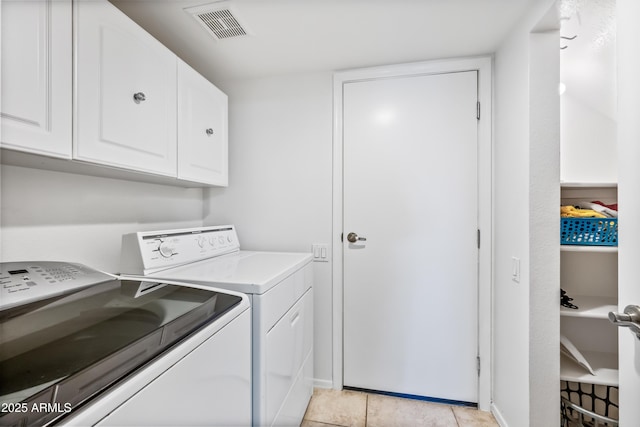 7949 W Pershing Ave, Peoria, AZ 85381 - washroom with washer and dryer, cabinet space, light tile patterned flooring, and baseboards