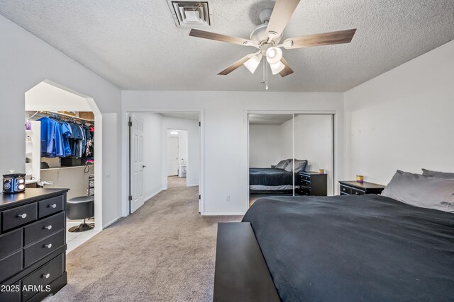 7949 W Pershing Ave, Peoria, AZ 85381 - carpeted bedroom featuring a closet, a textured ceiling, ceiling fan, and baseboards