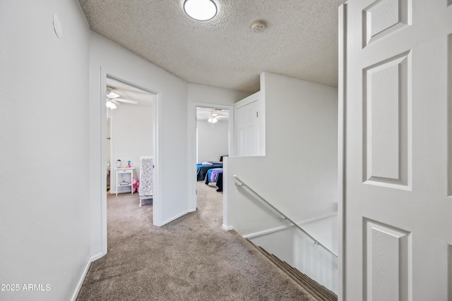 7949 W Pershing Ave, Peoria, AZ 85381 - corridor with an upstairs landing, carpet, a textured ceiling, and baseboards