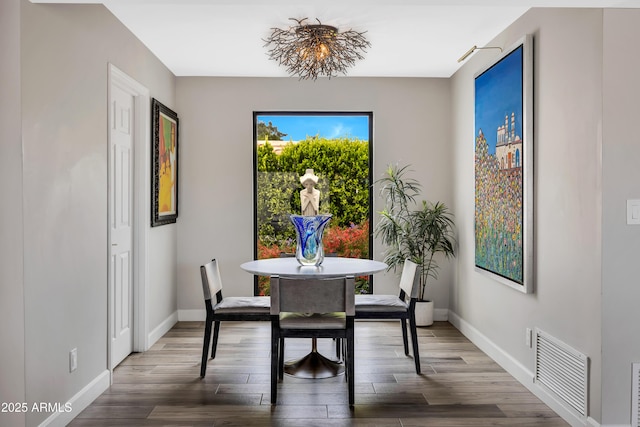 3109 E Sierra Madre Way, Phoenix, AZ 85016 - dining room with baseboards and wood finished floors