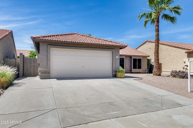 2730 E Desert Trumpet Rd, Phoenix, AZ 85048 - mediterranean / spanish-style home featuring a tile roof, stucco siding, driveway, and an attached garage