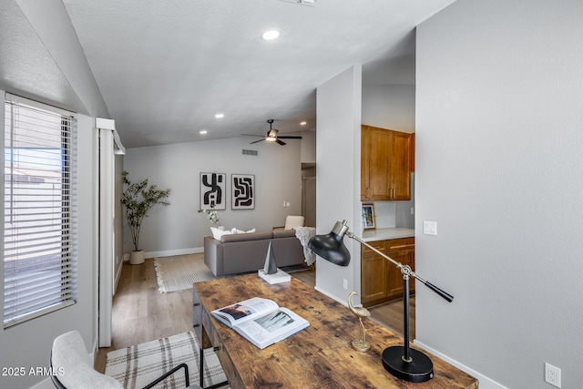 2730 E Desert Trumpet Rd, Phoenix, AZ 85048 - office area featuring lofted ceiling, wood finished floors, baseboards, ceiling fan, and recessed lighting