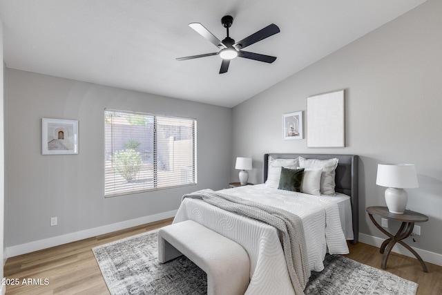 2730 E Desert Trumpet Rd, Phoenix, AZ 85048 - bedroom with lofted ceiling, baseboards, light wood finished floors, and ceiling fan