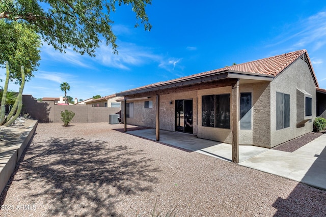 2730 E Desert Trumpet Rd, Phoenix, AZ 85048 - rear view of property with central AC unit, a patio area, stucco siding, and a tiled roof