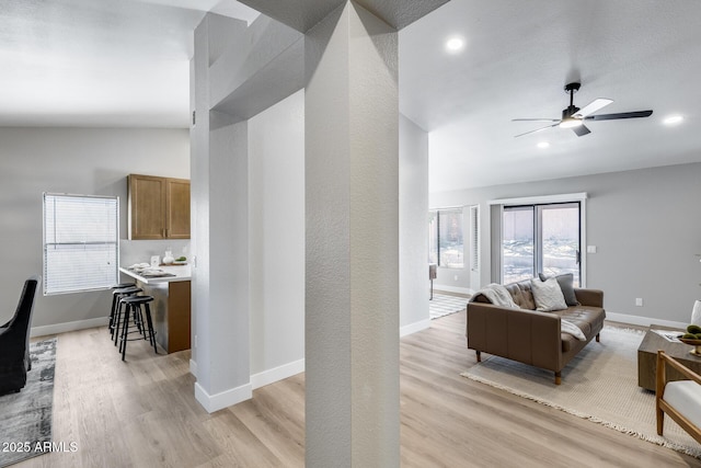 2730 E Desert Trumpet Rd, Phoenix, AZ 85048 - living area with light wood-style flooring, a ceiling fan, recessed lighting, and baseboards