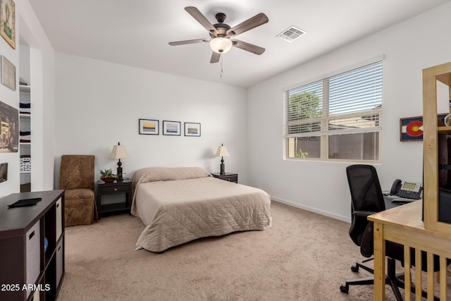 14233 W Georgia Dr, Surprise, AZ 85379 - bedroom with carpet, a desk, baseboards, and a ceiling fan