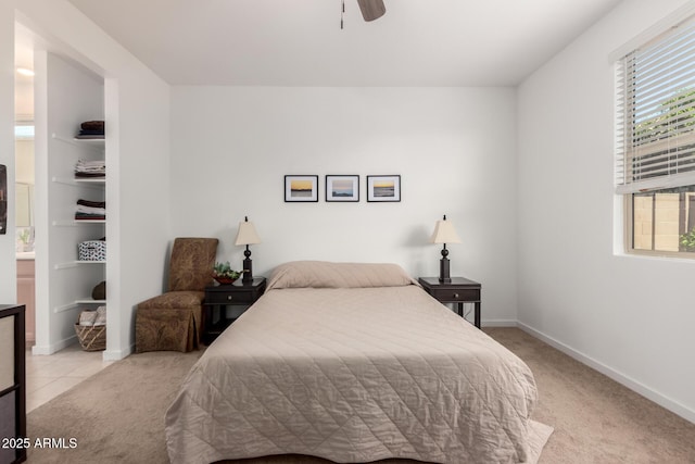14233 W Georgia Dr, Surprise, AZ 85379 - bedroom with light colored carpet, baseboards, and ceiling fan