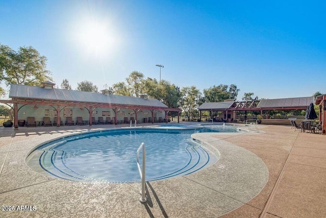 14233 W Georgia Dr, Surprise, AZ 85379 - community pool featuring a gazebo and a patio area