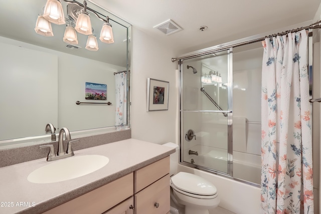 full bath featuring toilet, shower / bath combination with glass door, visible vents, and vanity