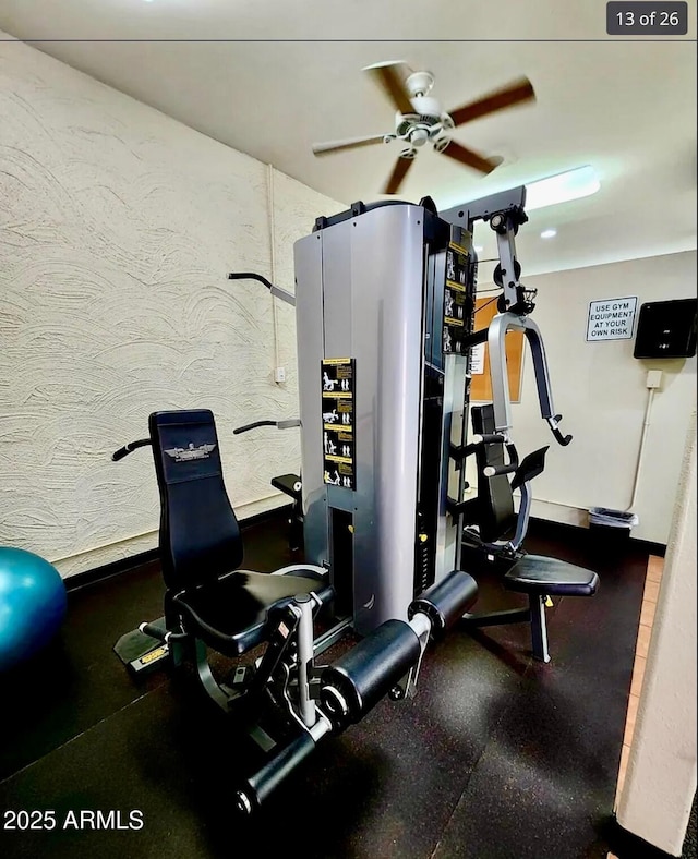 exercise room featuring ceiling fan