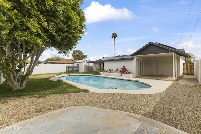 view of pool featuring a patio area, a fenced backyard, and a fenced in pool