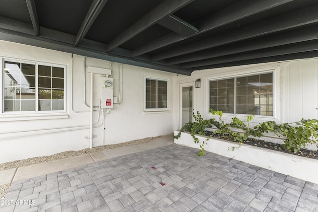 exterior space featuring tankless water heater