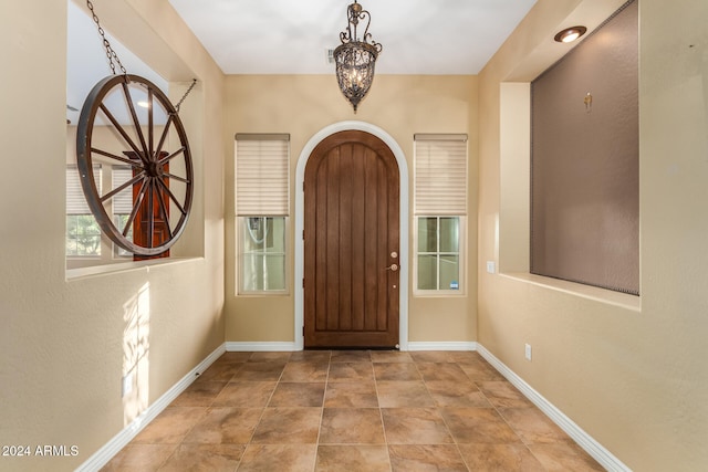 entrance foyer with an inviting chandelier