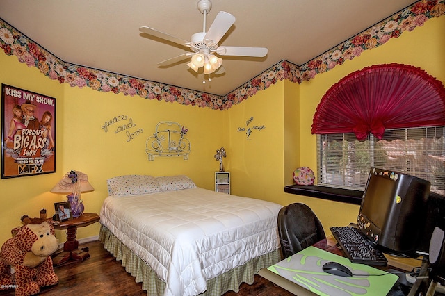 bedroom featuring ceiling fan and dark hardwood / wood-style floors