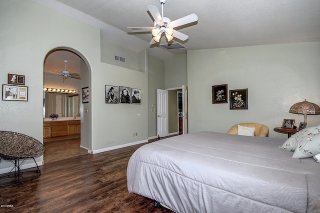 tiled bedroom featuring connected bathroom, high vaulted ceiling, and ceiling fan